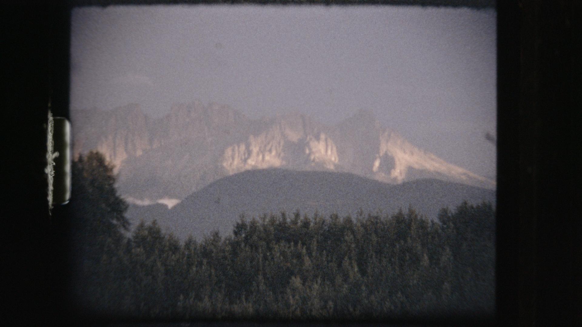 Scratched film frame with airplane